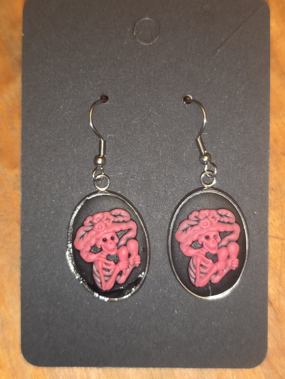 Pink Skeleton Cameo Earrings With Silver Tone Bezel & Hook Closures